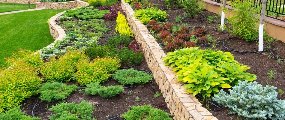 Retaining wall with planter beds in Apopka, FL.